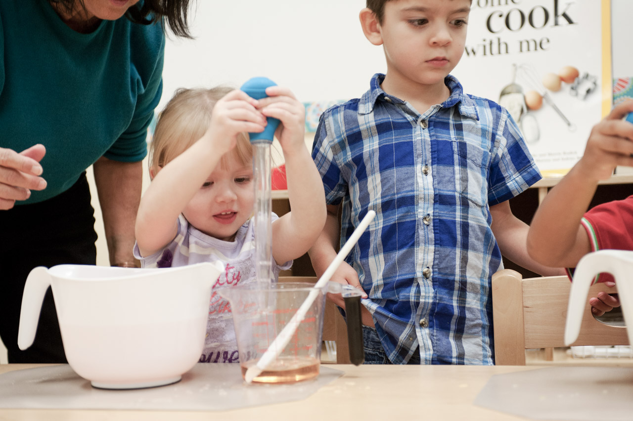 young children participating in an age appropriate cooking demonstration