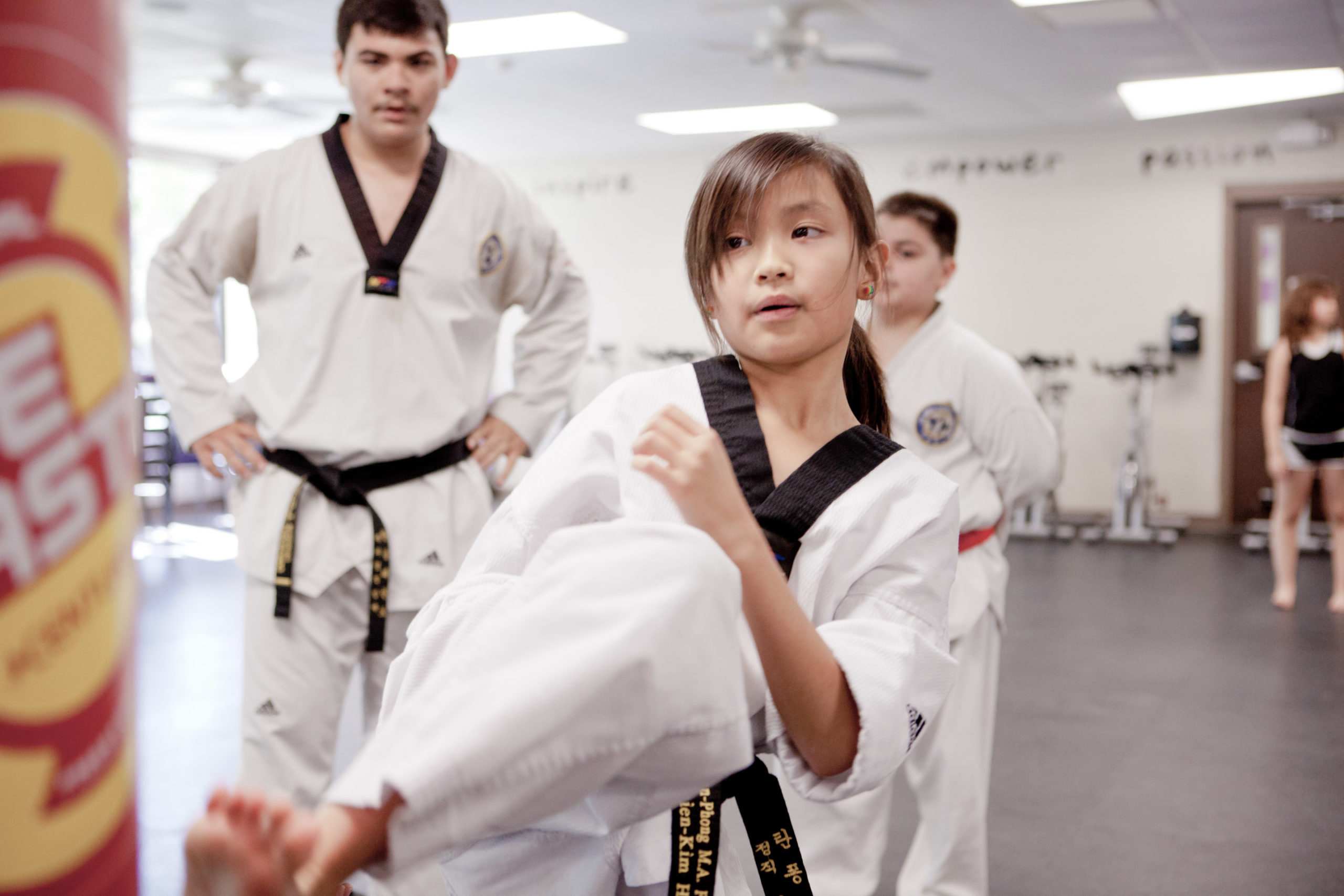 Girl doing karate kick