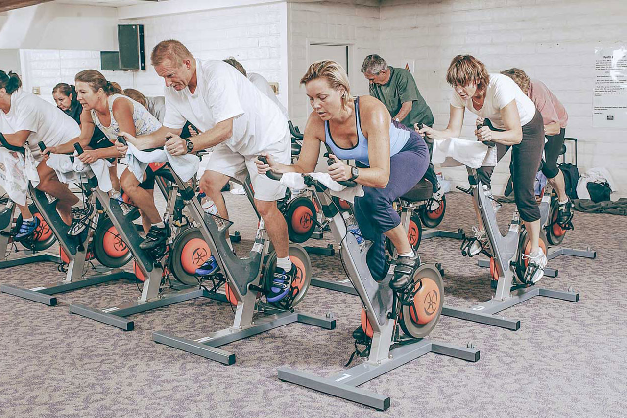 People working out on stationary bikes