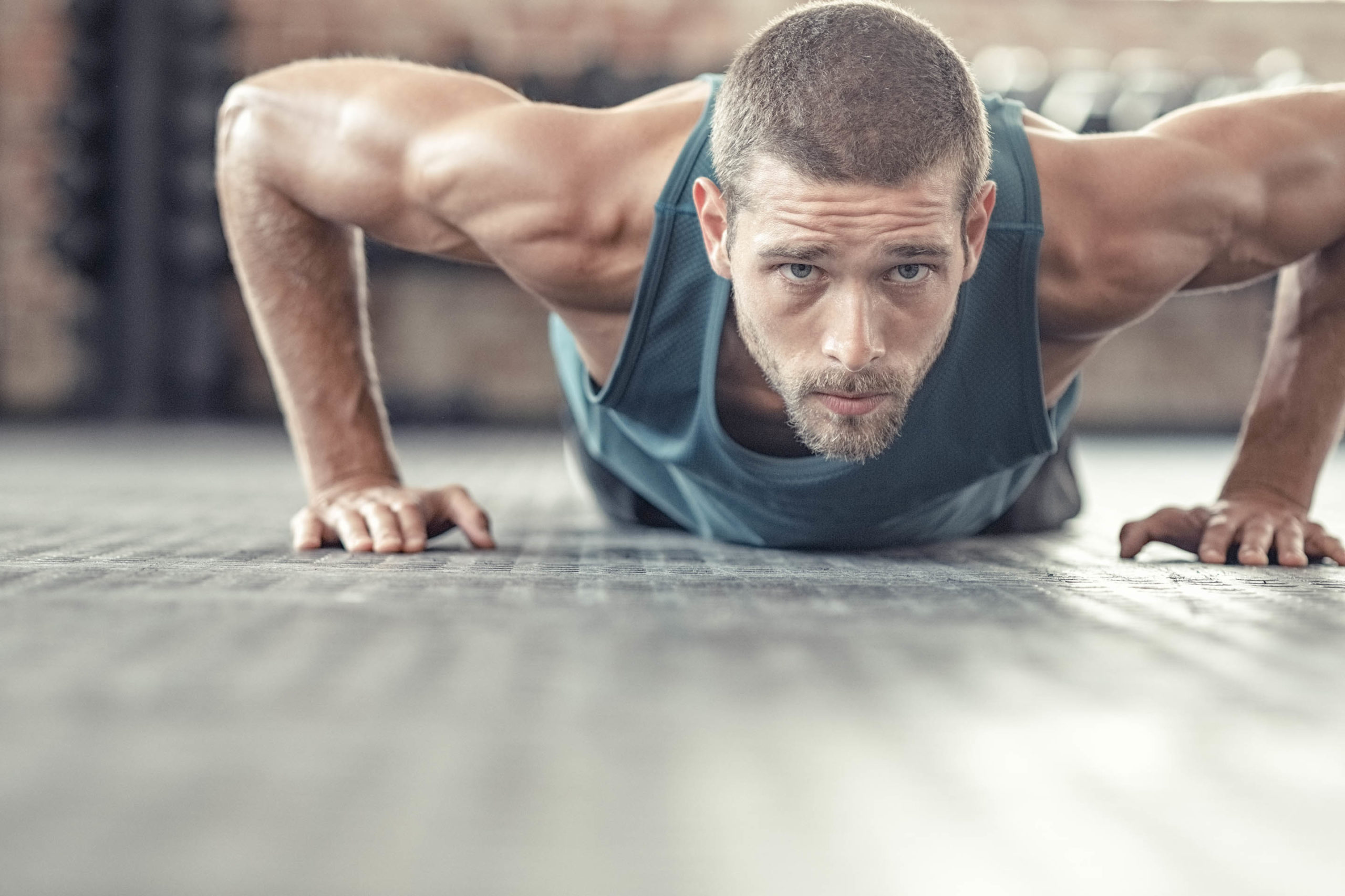 muscular man doing pushup