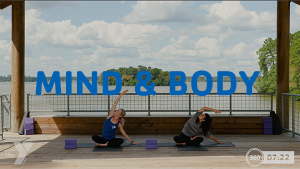 Mind & Body text with ladies engaged in yoga in the background