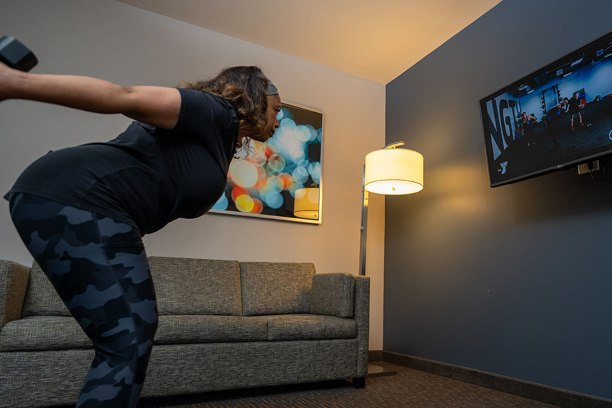 A person doing virtual, at-home workouts